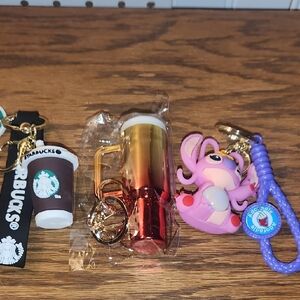 Starbucks Keychain Trio with Black, Gold, and Pink Accents